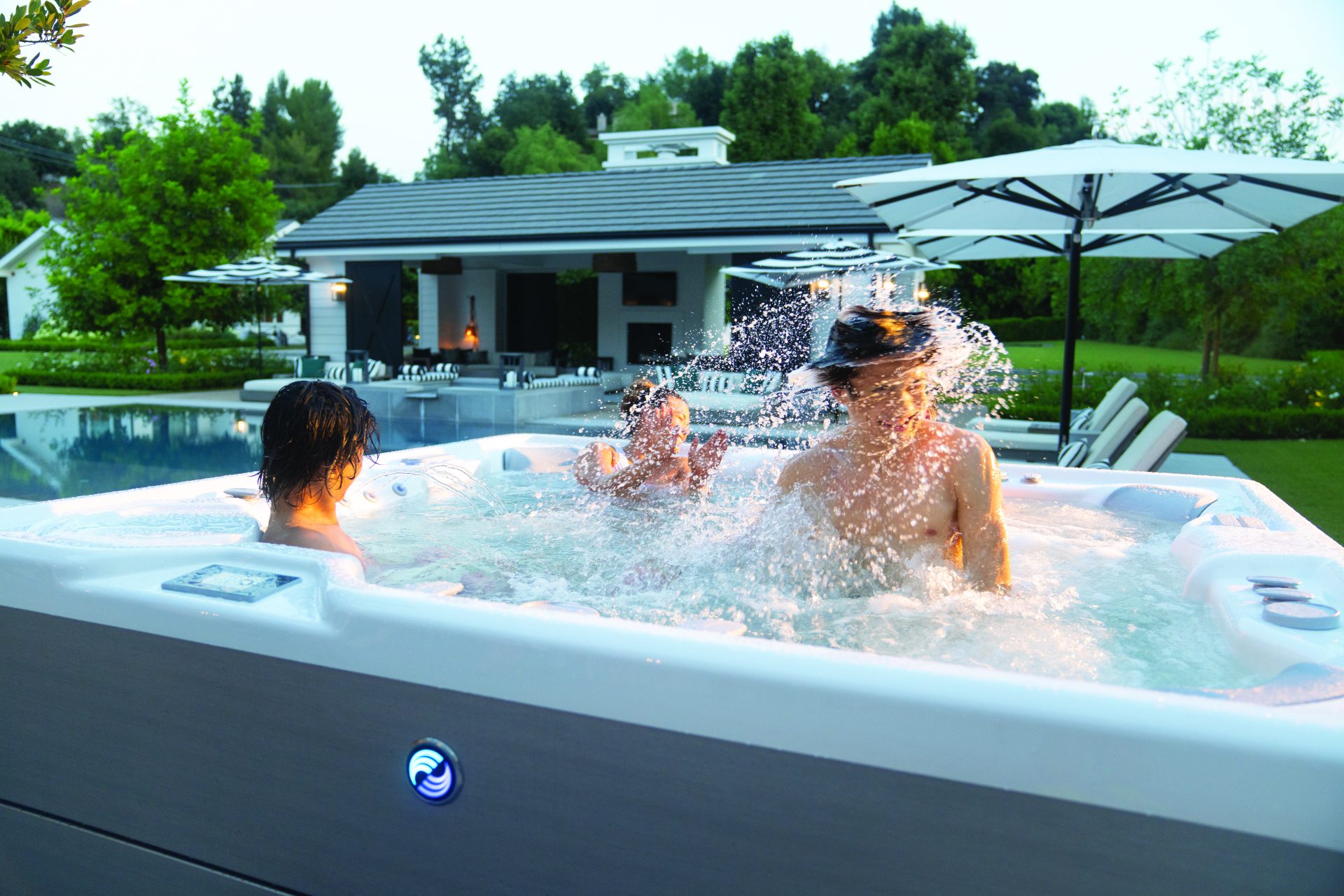 Family enjoying a hot tub